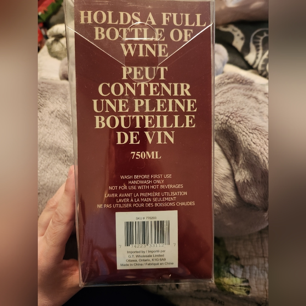 Novelty giant glass that holds a bottle of wine